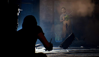 A man stands in shadow facing away from the camera while LeatherFace stands in the light with a chain saw.